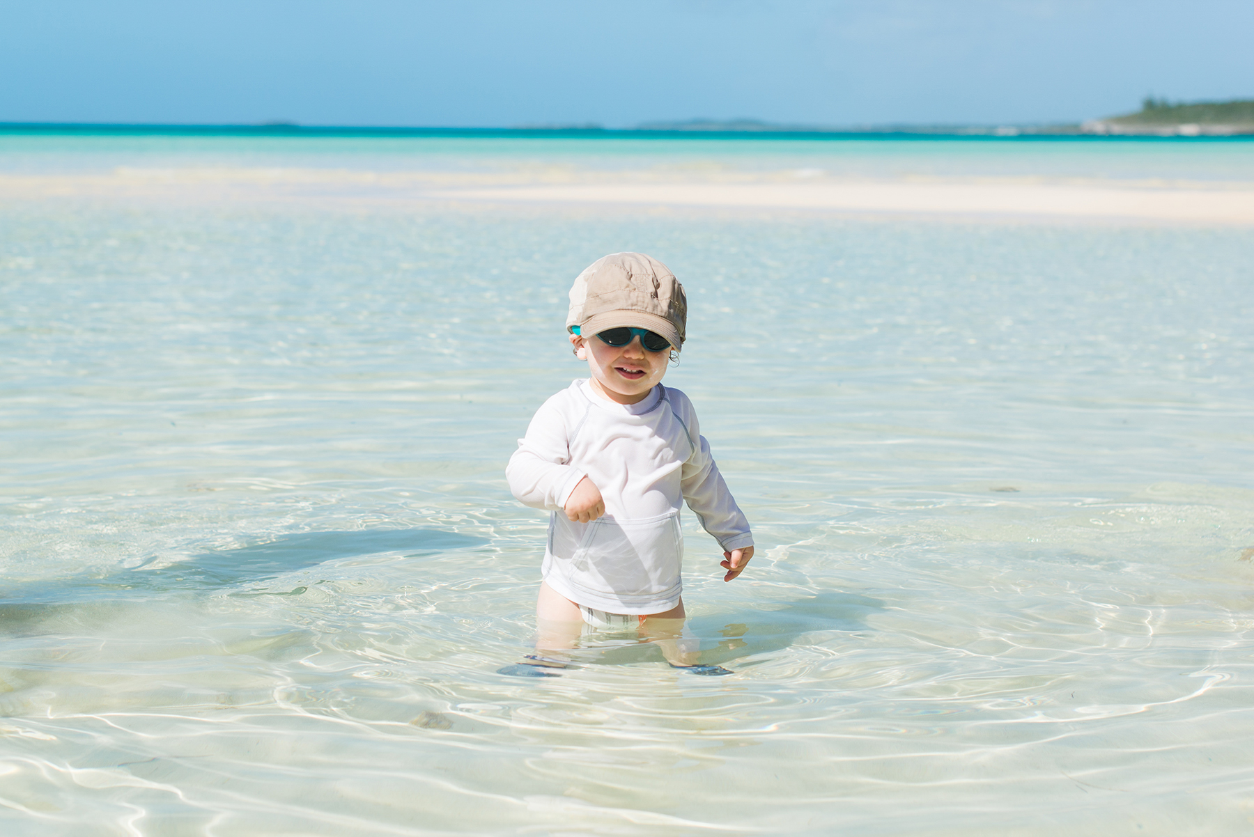 toddler-playing-in-beautiful-water-bahamas