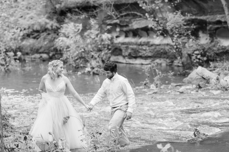 walking-through-water-wedding-outdoor-adventurous-couple