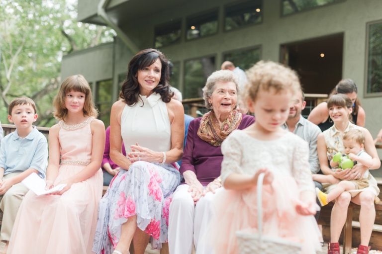 grandma-smiles-flower-girl-aisle-austin-wedding