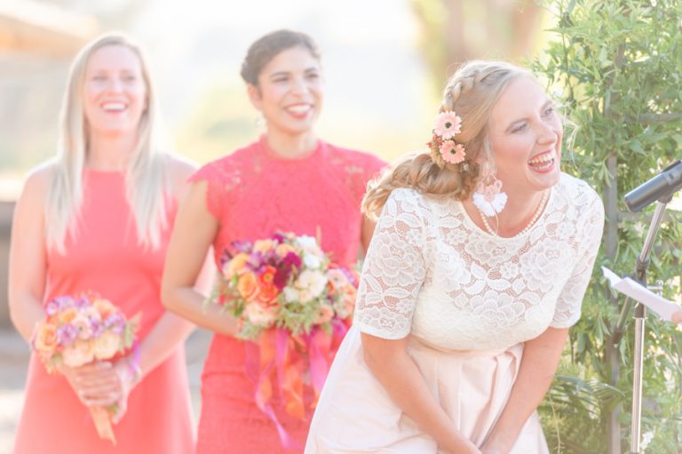bride-laughs-flowers-hair-ceremony-austin-wedding