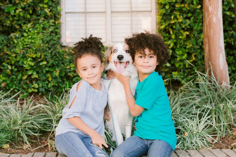 twins-hug-dog-downtown-family-photos-austin