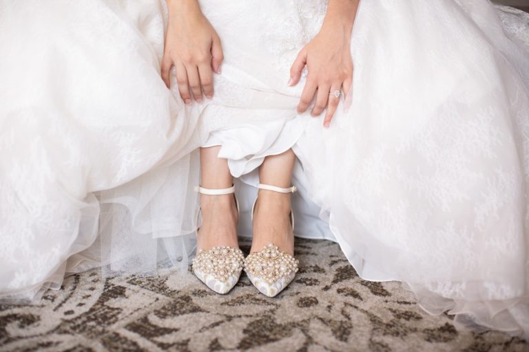 bride-showing-off-shoes-ring-san-antonio-wedding