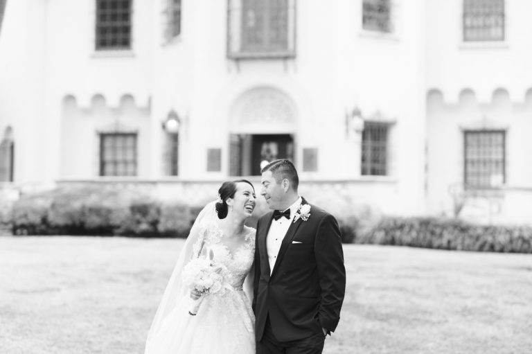 bride-laughs-wioth-groom-outside-mcnay-art-museum