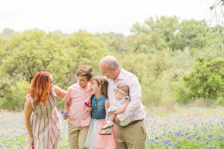 candid-family-moment-wildflowers-reimers-ranch