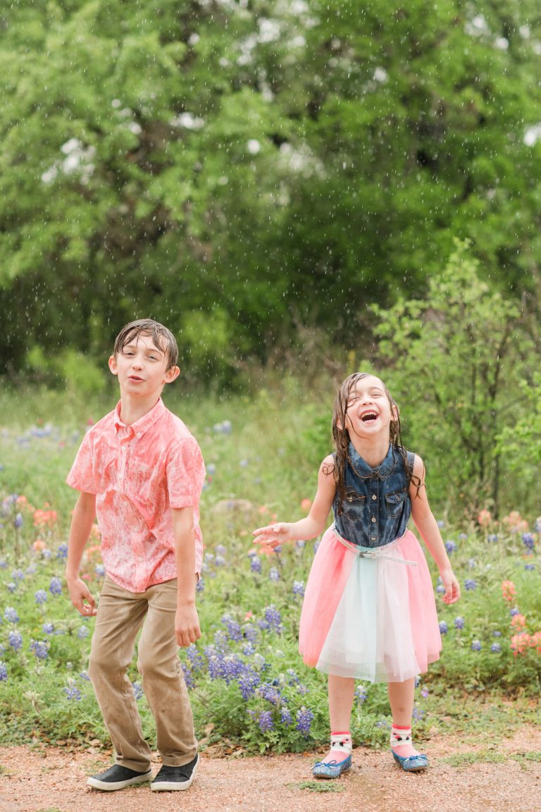 kids-soaked-after-rain-shower-dripping=springs-photographers