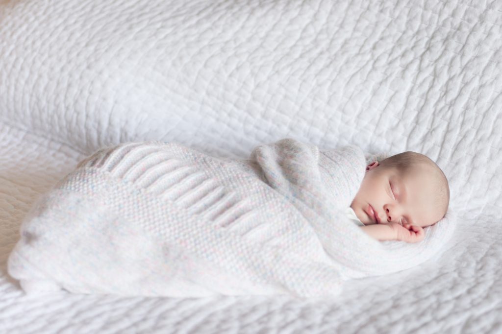 baby-wrapped-white-blanket-austin-newborn-photos