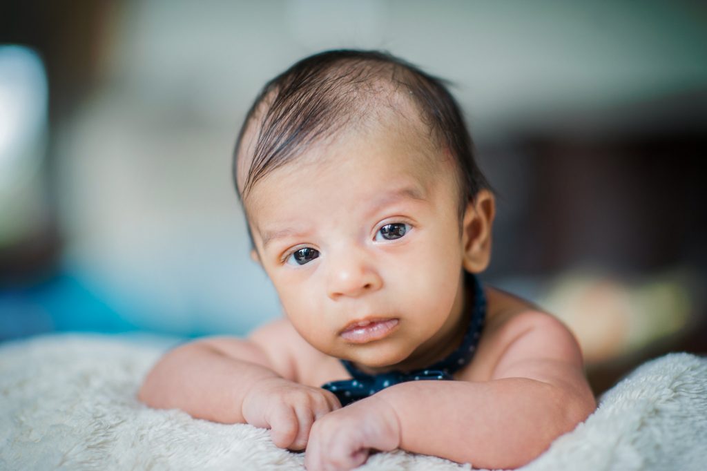 baby-boy-holds-head-up-for-austin-newborn-photo