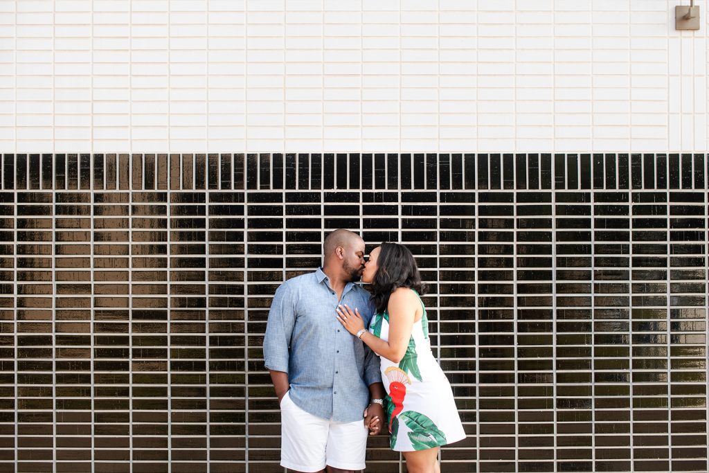 couple-kisses-engagement-photos-mural-austin