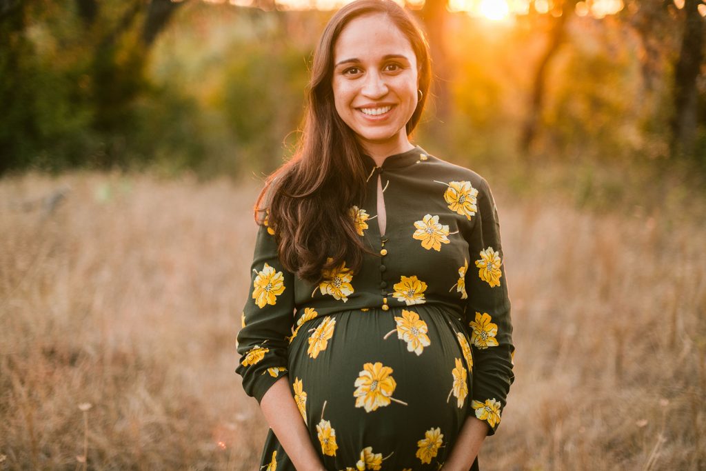 smiling-pregnant-woman-sunset-lakeway-professional-photos