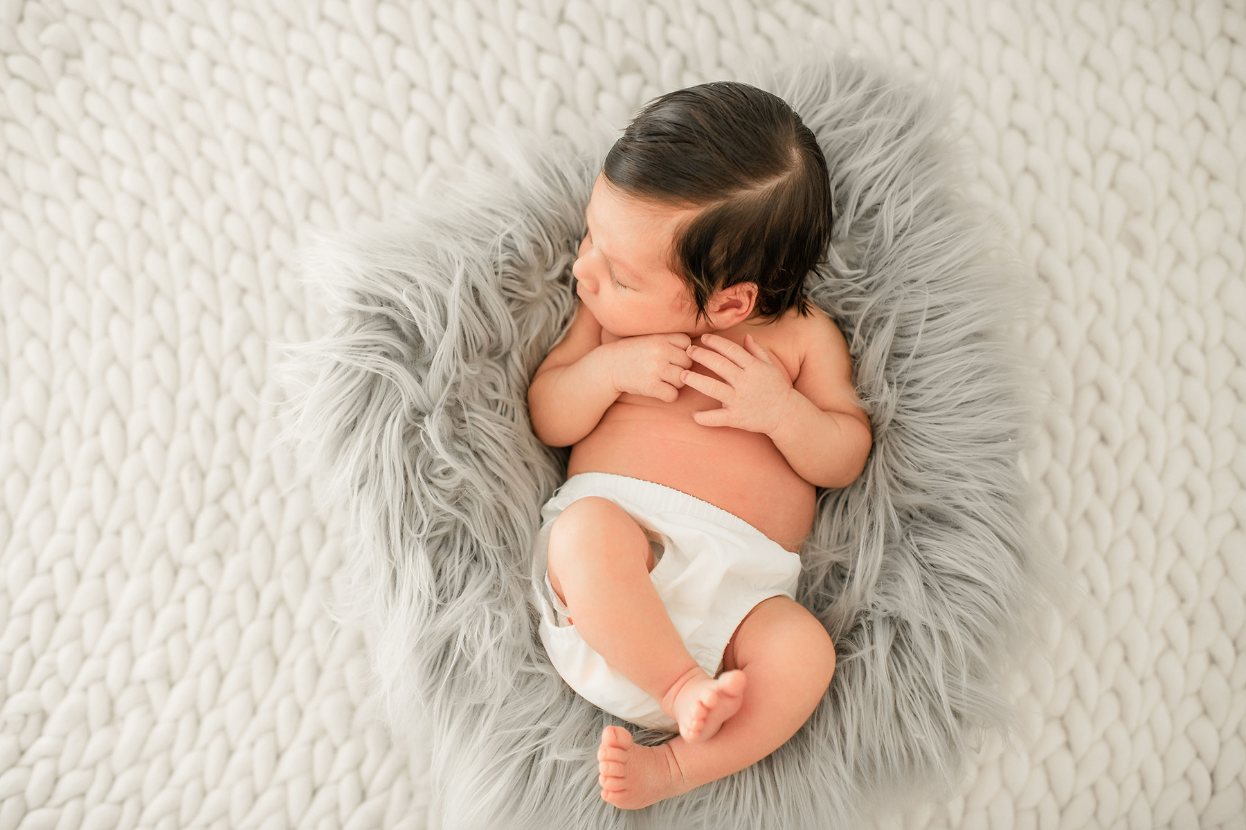 newborn-baby-photographer-white-rug-austin-texas