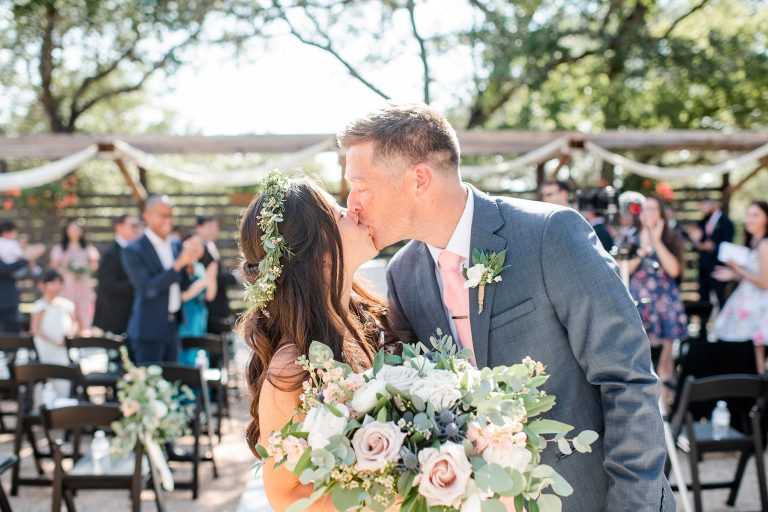 bride-groom-kiss-after-ceremony-prima-vista-wimberley