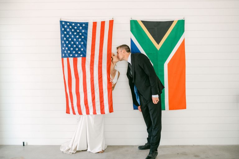 international-wedding-couple-austin-texas-flags