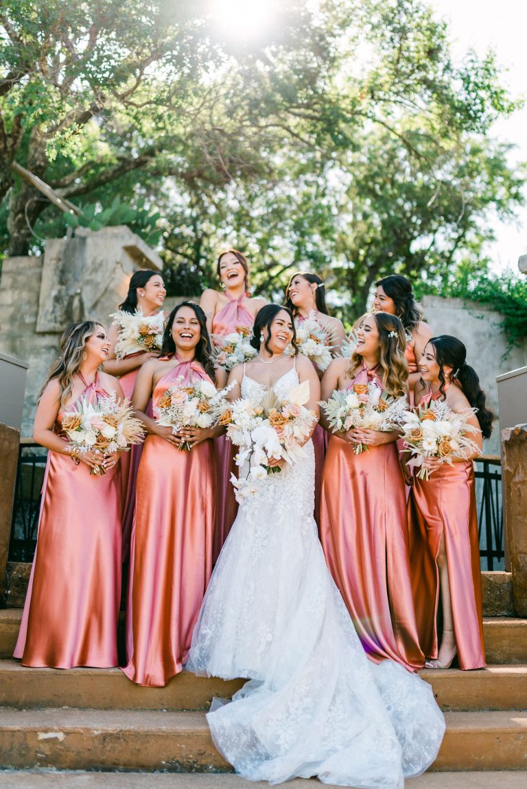 bridesmaids-laugh-pink-dresses-austin-weddings