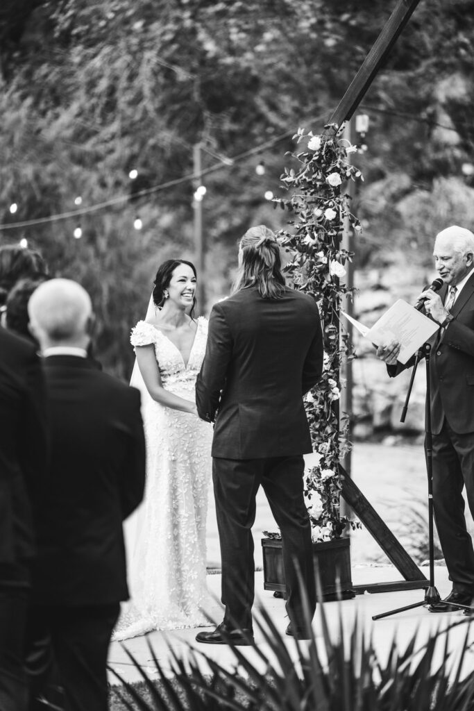 bride-smiling-at-ceremony-remi's-ridge