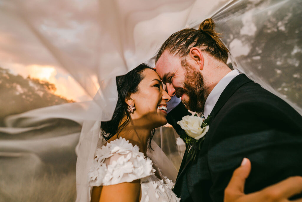 bride-and-groom-under-veil-austin-wedding