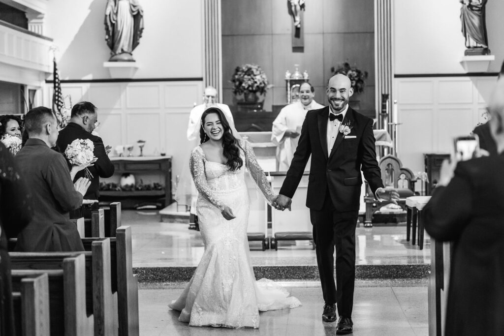 Smiling-bride-groom-processional-austin-church