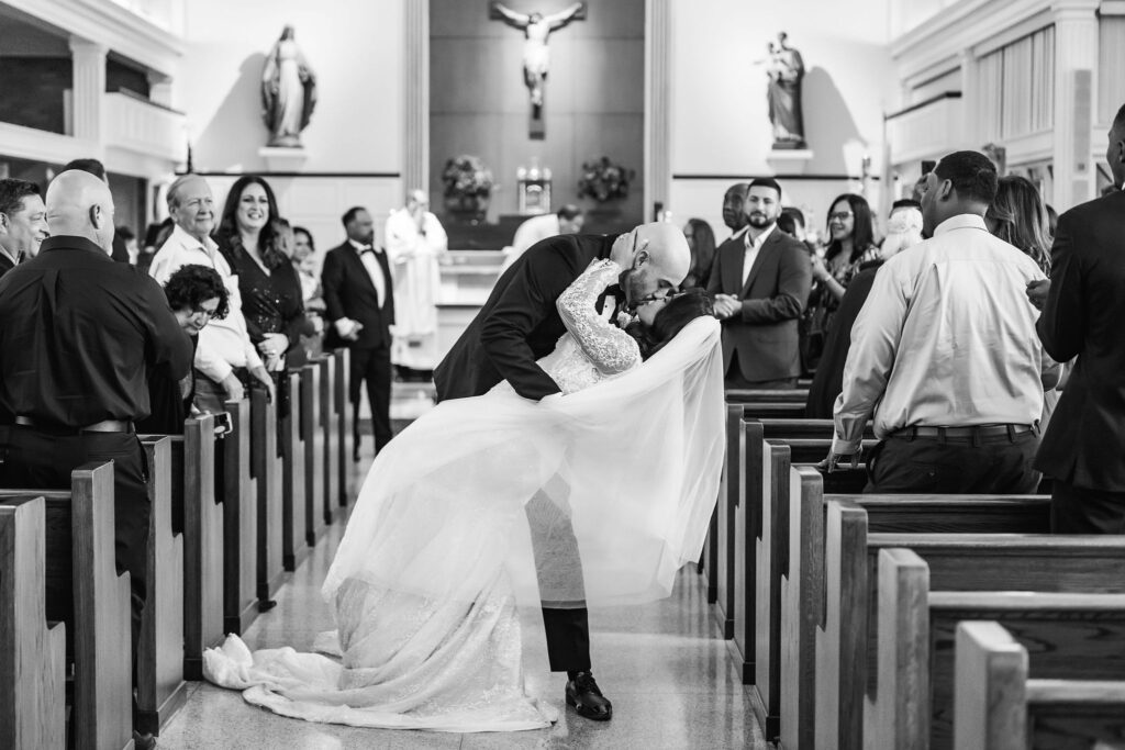 Kiss-end-aisle-Austin-weddings