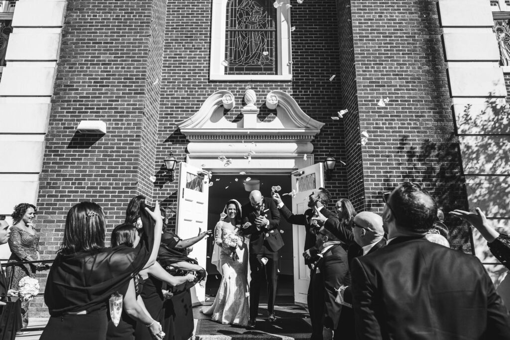 End-ceremony-throwing-flowers-Austin-church-weddings