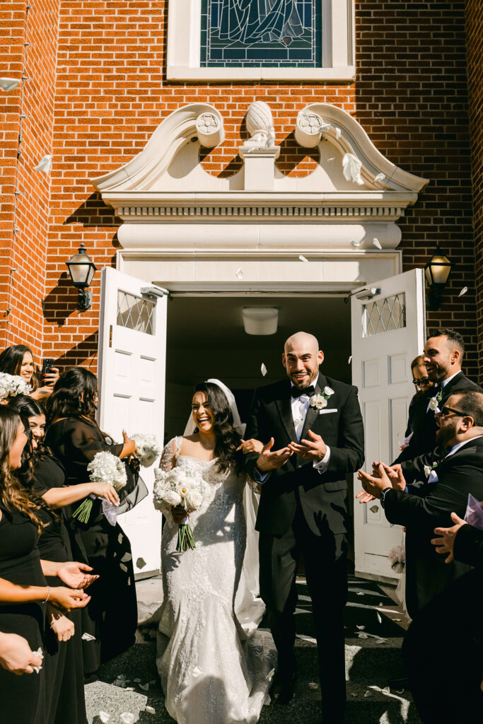 happy-bride-groom-exit-church-Austin