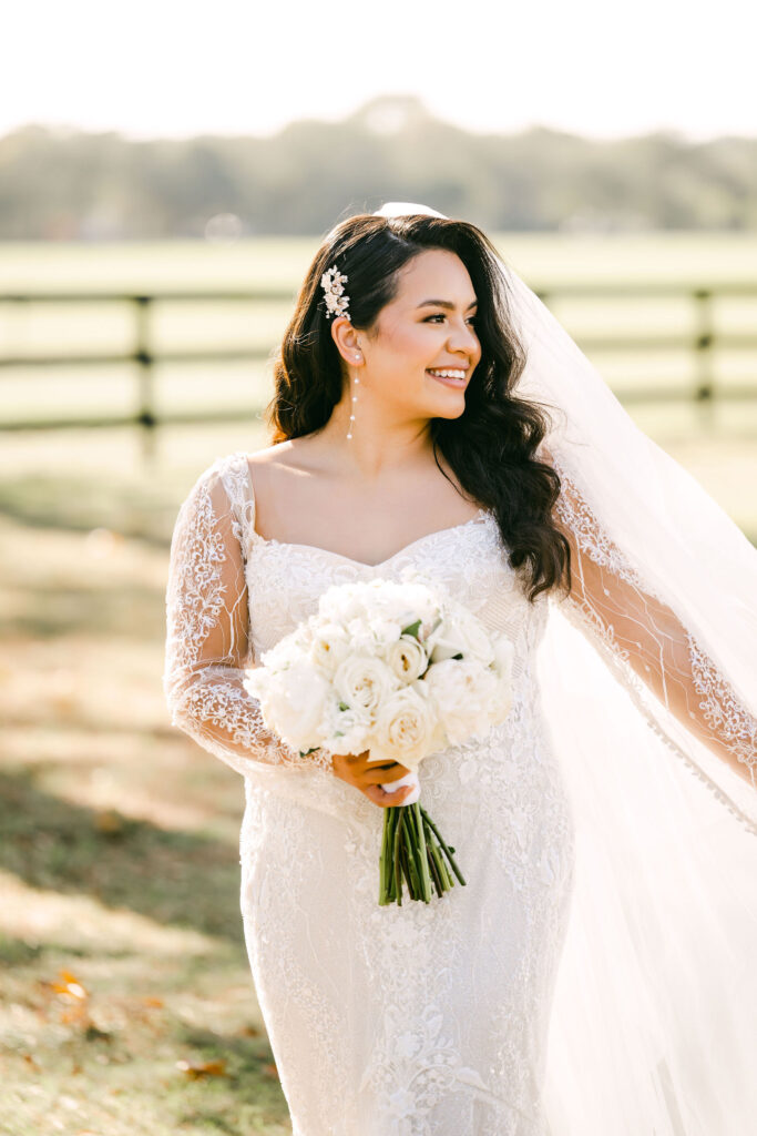 Bride-posing-farm-outside-Austin