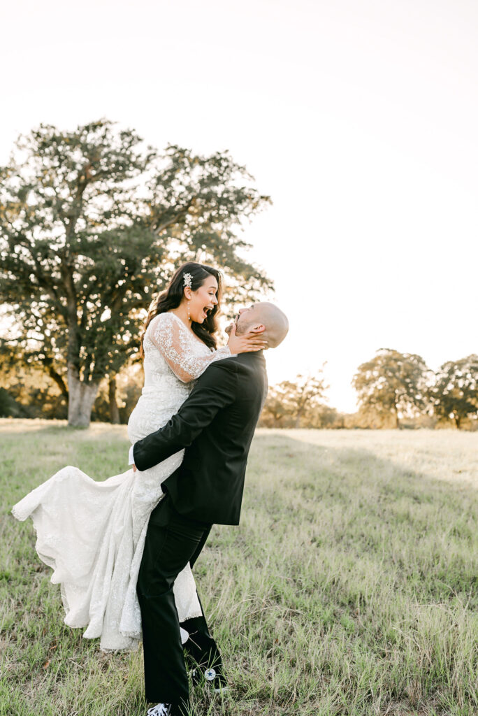 Groom-picks-up-bride-after-Austin-wedding