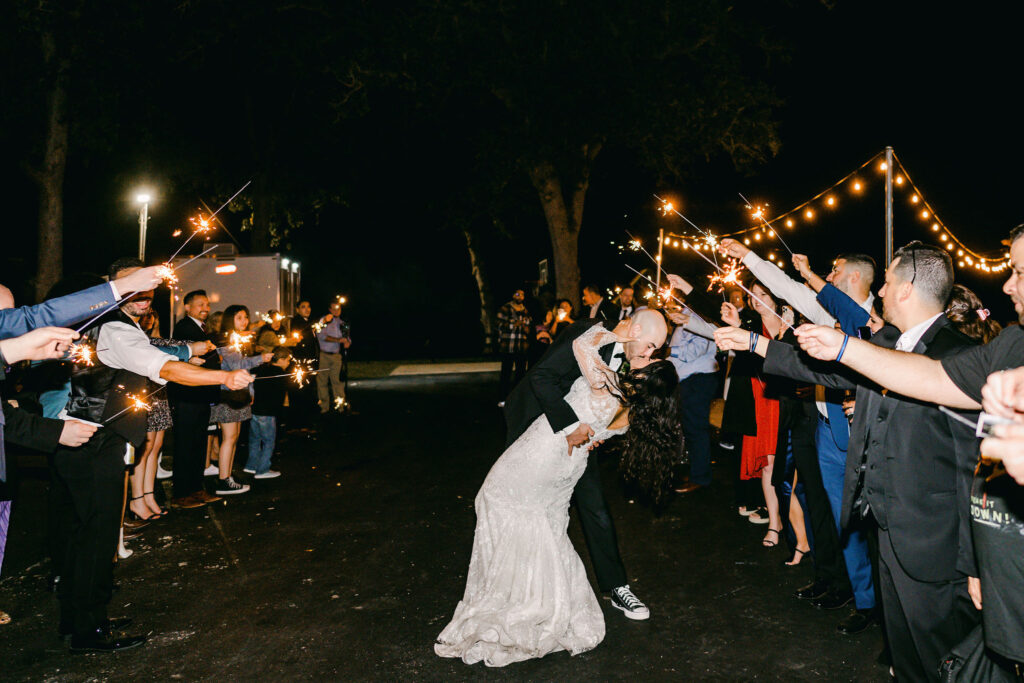 Austin-bride-groom-kiss-under-sparklers