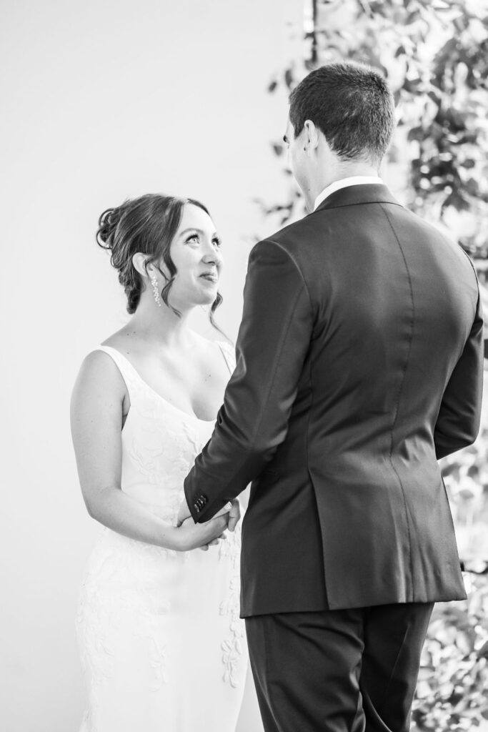 Bride-smiling-groom-during-ceremony-vows-Austin-weddings