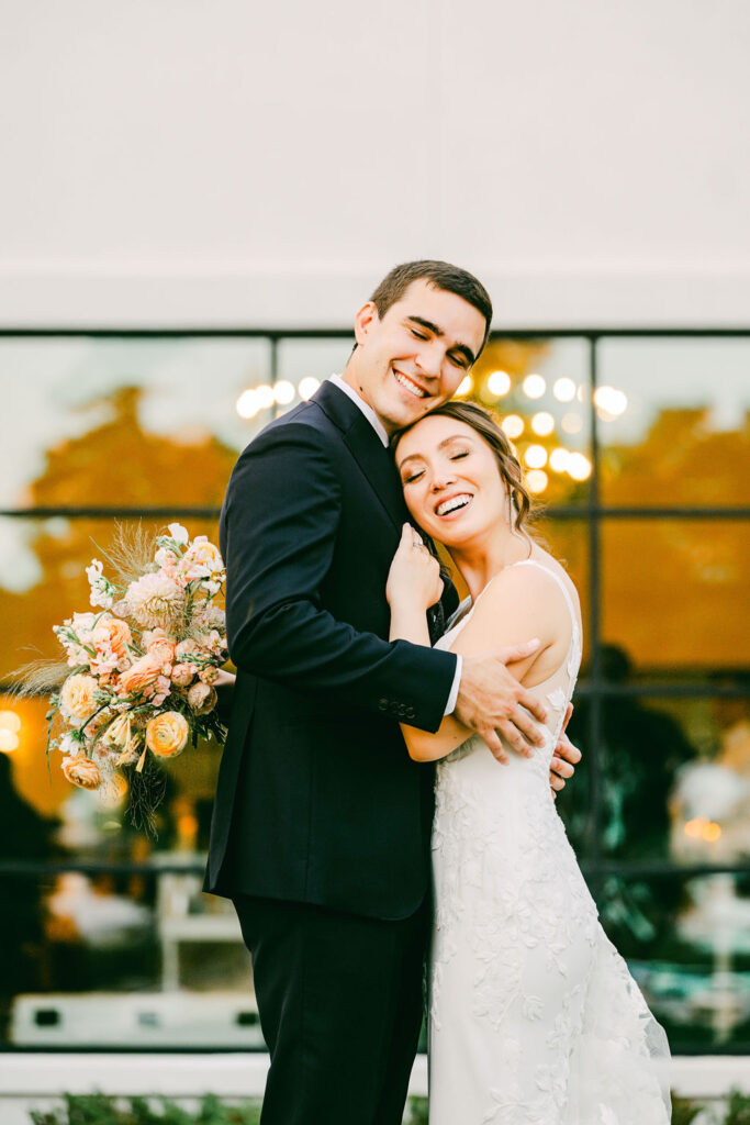 Bride-groom-embrace-Austin-wedding-photographer