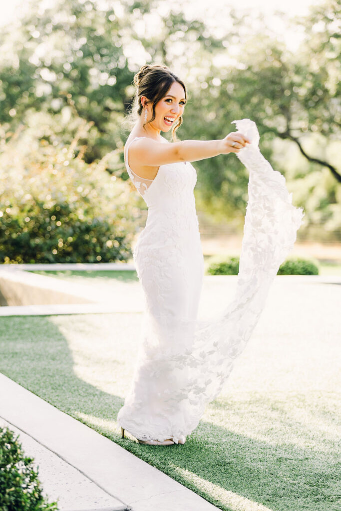 Austin-bride-dances-with-dress-wedding-photographers