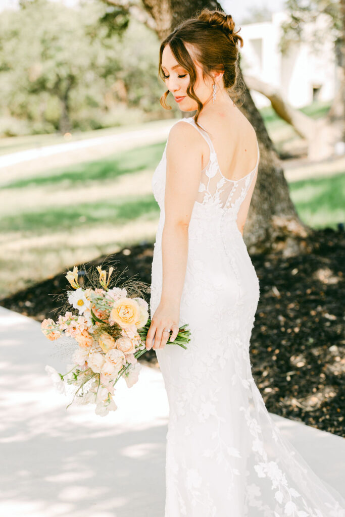 Bride-holding-bouquet-the-arlo-austin-wedding-venues