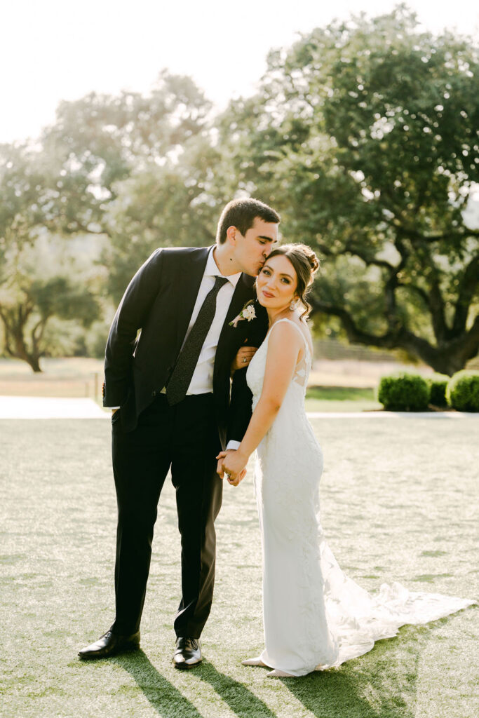 couple pose during sunset photos