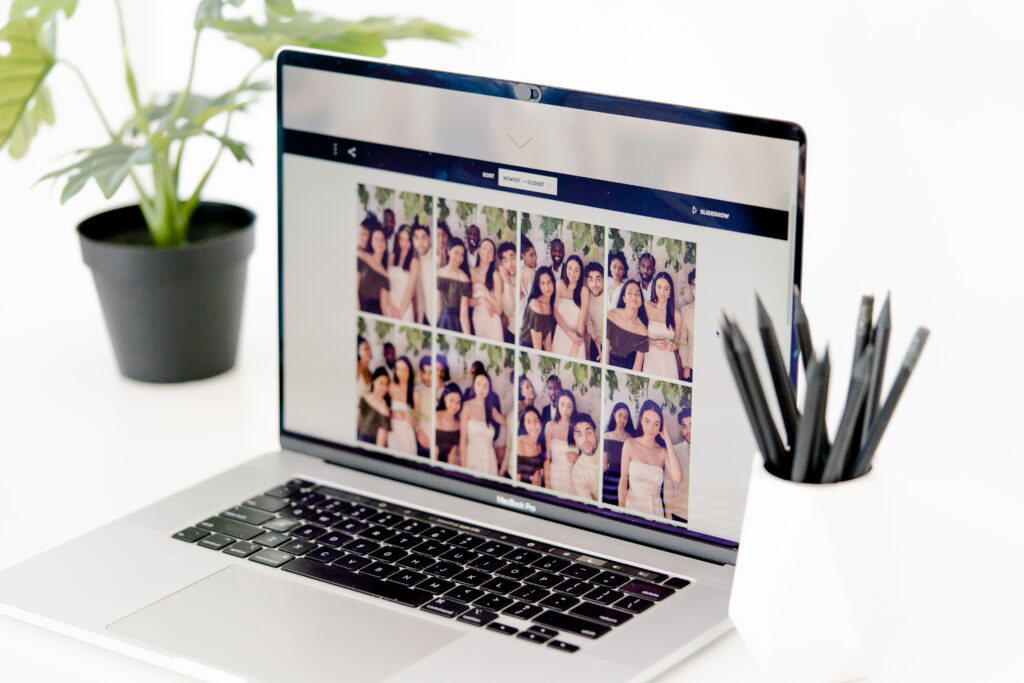 photo booth photos on a laptop