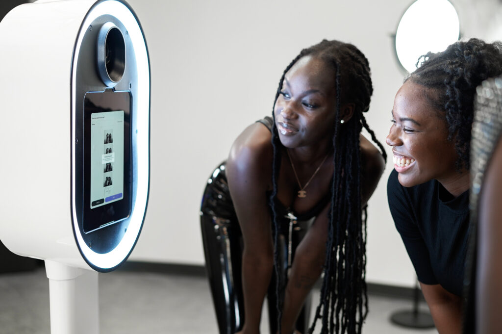 guests using the touchscreen before using the photo booth