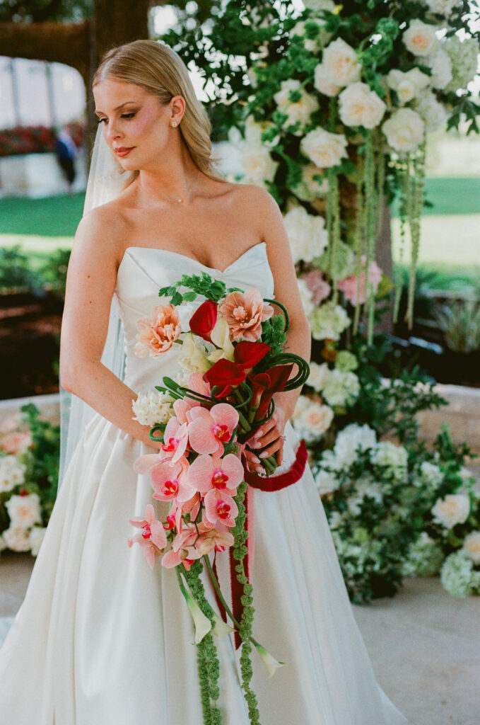 wedding film photography of bride with wedding bouquet