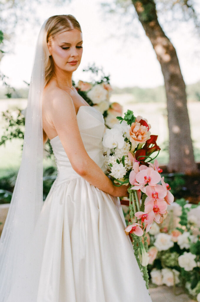 wedding film photography of bride and wedding bouquet