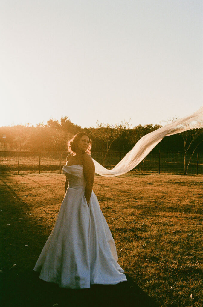 wedding film photography of bride during sunset